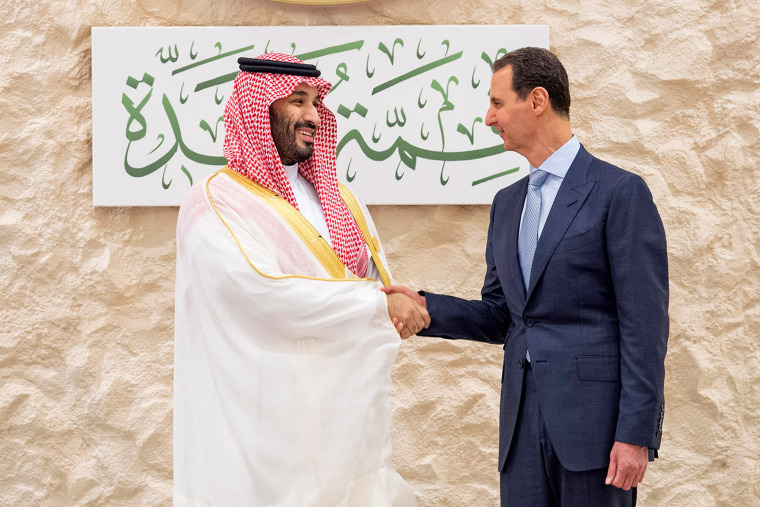 Saudi Crown Prince Mohammed bin Salman greets Syrian President Bashar Assad during the Arab summit in Jeddah, Saudi Arabia, on May 19, 2023. 