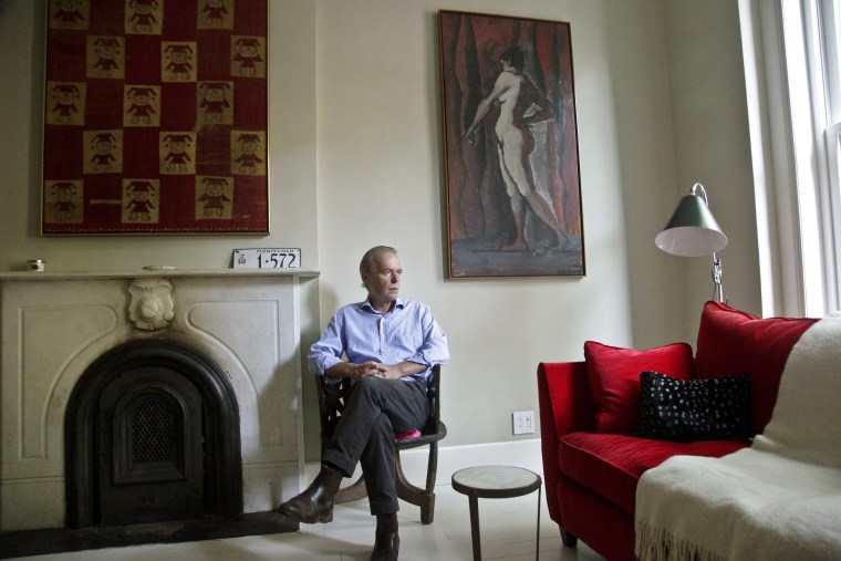British novelist Martin Amis poses in the living room of his new home in the Brooklyn borough of New York on Aug. 17, 2012. 
