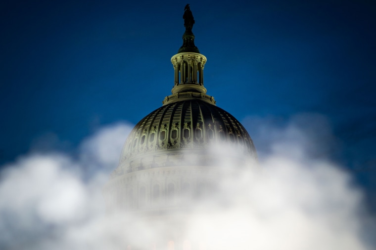 Steam from an exhaust vent on the east front of the U.S. Capitol complex partially obscures the dome on March 21, 2023. 