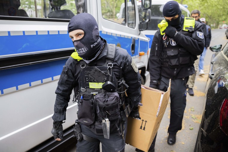 Prosecutors in Germany say authorities have raided 15 properties across the country and seized assets in an investigation into the financing of protests by the Last Generation climate activist group. (Christoph Soeder/dpa via AP)