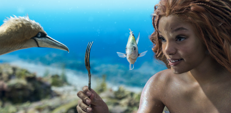 Scuttle (voiced by Awkwafina), Flounder (voiced by Jacob Tremblay), and Halle Bailey as Ariel in Disney's live-action "The Little Mermaid."