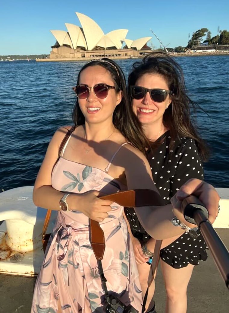 Carrie Cherkinsky. caption: Carrie Cherkinsky, right, was traveling in Australia in March when she started experiencing severe abdominal pain. Doctors discovered a mass on her right ovary.