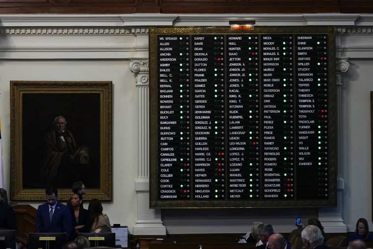 A ballot board lights up with a majority green light as the House votes to impeach Attorney General Ken Paxton at the Texas State Capitol in Austin, Texas, Saturday, May 27, 2023. 