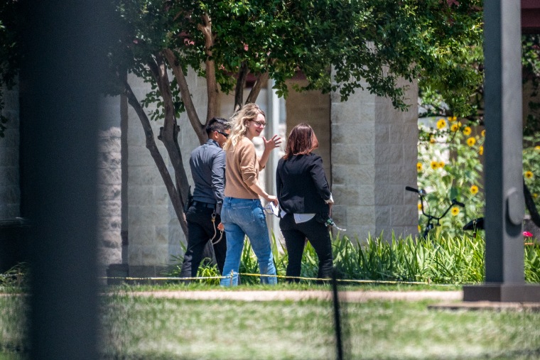 Elizabeth Holmes, founder of Theranos Inc., center, arrives at Federal Prison Camp Bryan in Bryan, Texas, on May 30, 2023.