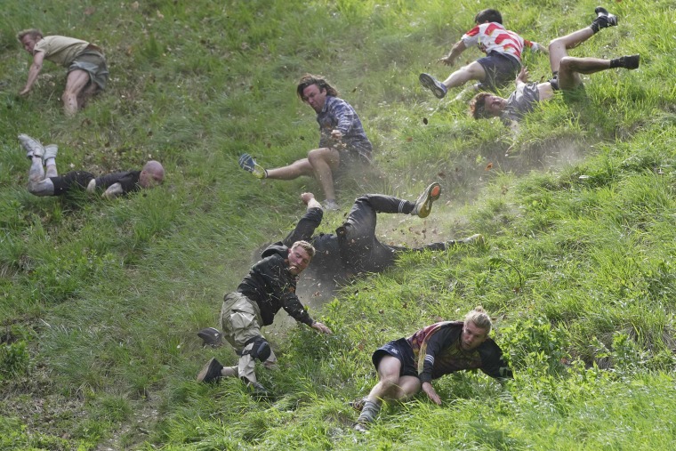 The Cooper's Hill Cheese-Rolling and Wake is an annual event where participants race down the 200-yard (180 m) long hill chasing a wheel of double gloucester cheese.