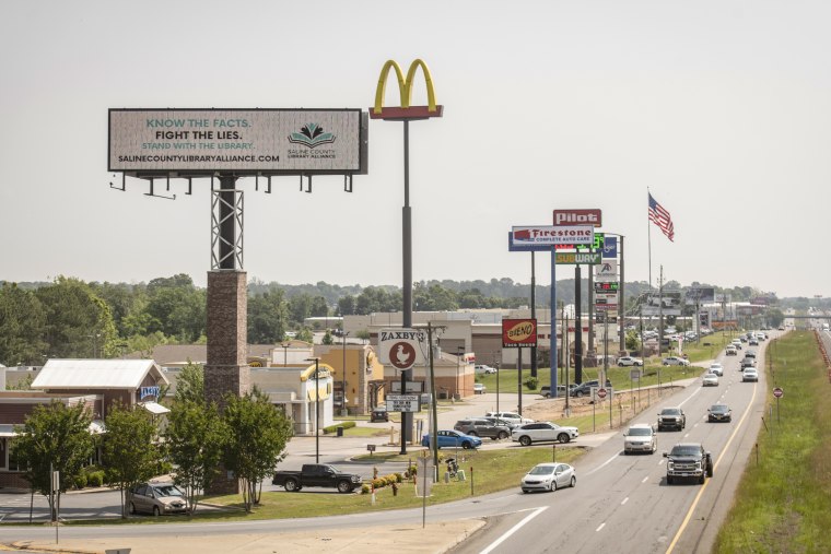 A billboard from a group in support of public libraries is seen near Benton, Ark., on May 25, 2023. 