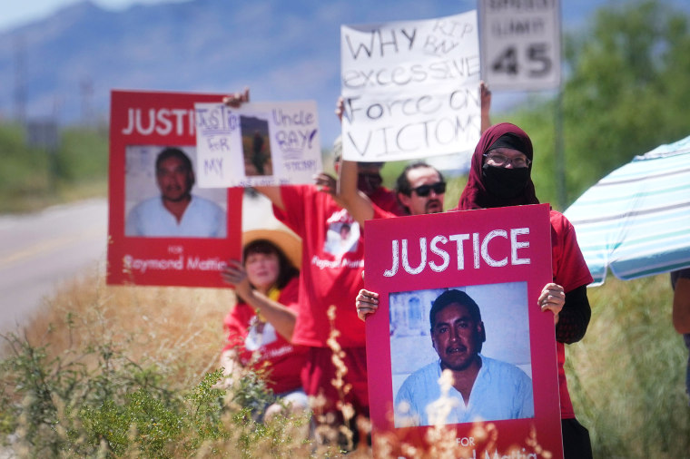 People gather outside of the Ajo Border Patrol Station to protest the fatal Border Patrol shooting of Raymond Mattia, a Tohono O'odham Nation member who was killed on May 18, 2023, near Ajo, Arizona.