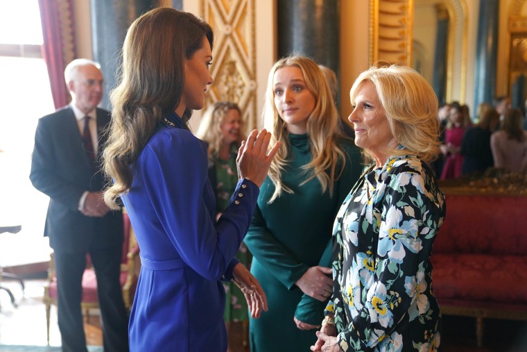 Catherine, Princess of Wales speaks with the First Lady of the United States, Dr Jill Biden and her grand daughter Finnegan Biden during a reception at Buckingham Palace for overseas guests attending the coronation of King Charles III on May 5, 2023 in London, England. 