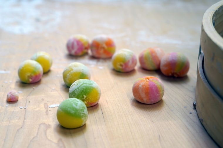 Rainbow dango are small, bite-sized colorful balls of sweet mochi rice flour.