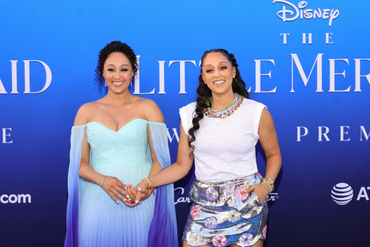 Tamera Mowry-Housley and Tia Mowry attend the world premiere of Disney's "The Little Mermaid"