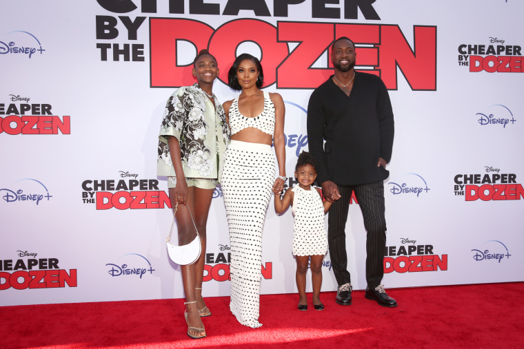 Zaya Wade, Gabrielle Union, Kaavia Union Wade and Dwyane Wade at the "Cheaper By the Dozen" premiere at El Capitan Theatre in Hollywood, California on March 16, 2022.