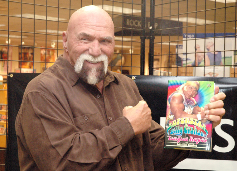WWE Superstar Billy Graham signs his book "Tangled Ropes" 
