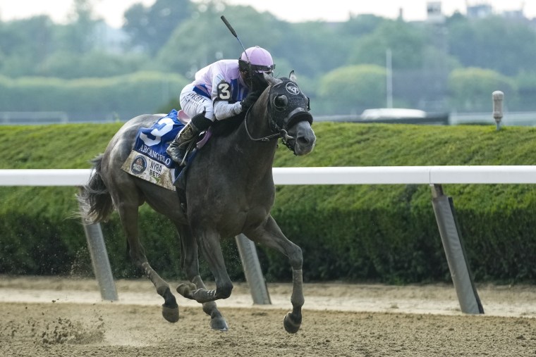 Arcangelo, with jockey Javier Castellano, breaks away from the pack in the final stretch to win the 155th running of the Belmont Stakes horse race Saturday.