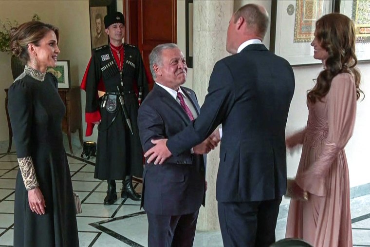Image: This screen grab taken from a footage shows King Abdullah II and Queen Rania welcoming Britain's Prince William and Princess Catherine at the Zahran Palace in Amman on June 1, 2023 on the day of the royal wedding ceremony of Crown Prince Hussein and Rajwa al-Saif.