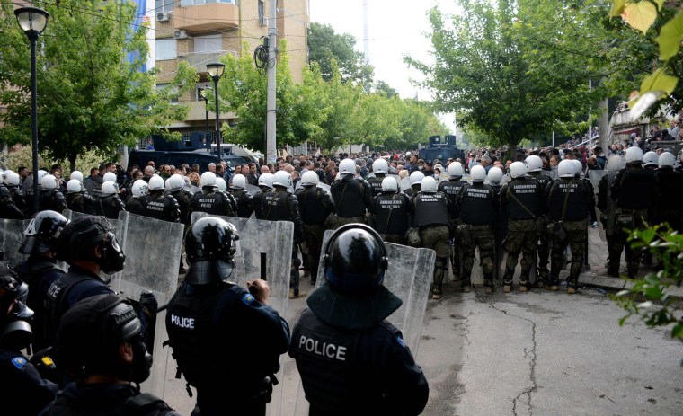 Police fired teargas during clashes with ethnic Serbs protesting to demand the withdrawal of law enforcement officers from northern Kosovo along with new ethnic Albanian mayors. 
