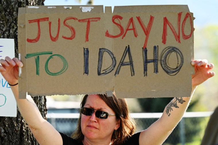 Opponents of the Greater Idaho Movement gather in Enterprise, Ore., on May 12, 2023. 