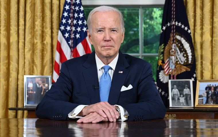 US President Joe Biden sits at his desk ahead of addressing the nation on averting default and the Bipartisan Budget Agreement, in the Oval Office of the White House in Washington, DC, June 2, 2023.