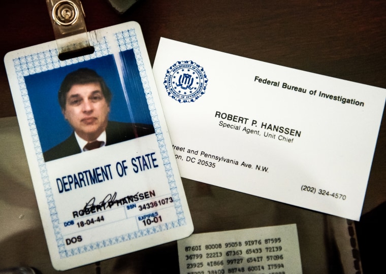 Image: The identification and business card of former FBI agent Robert Hanssen inside a display case at the FBI Academy in Quantico, Va., on May 12, 2009.