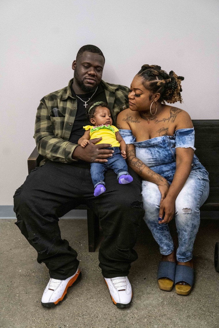 Kenyatta Jefferson, left, his daughter Shyne Powell, two months, and girlfriend Shermika Powell, at housing court in the 36th District Court in Detroit on June 5, 2023.