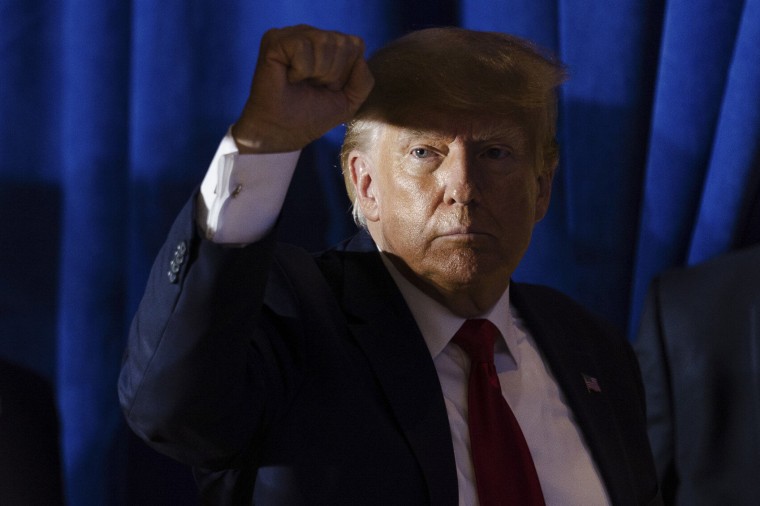 Image: Former President Donald Trump raises his fists at supporters following a rally campaigning for the GOP presidential nomination, in Manchester, N.H. on April 27, 2023. (Sophie Park/The New York Times)