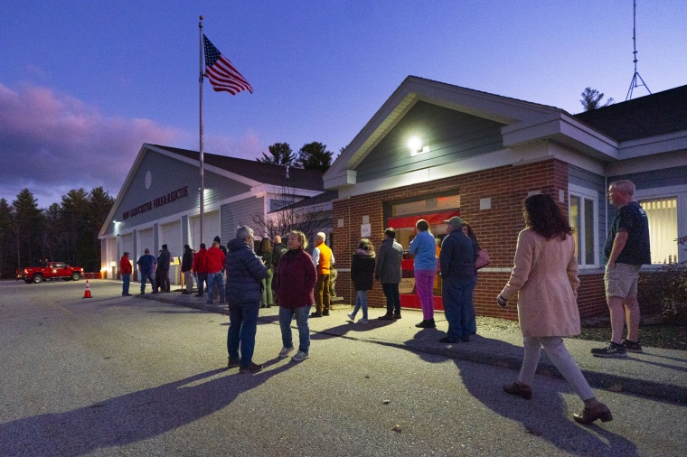Voters wait for the doors to open at 6 a.m. to cast their ballots at the fire station in New Gloucester, Maine, on Nov. 8. 