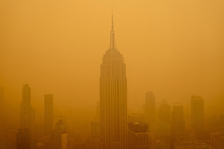 NYC landmarks are blanketed in smoke pouring across the Northeast from  Canadian wildfires