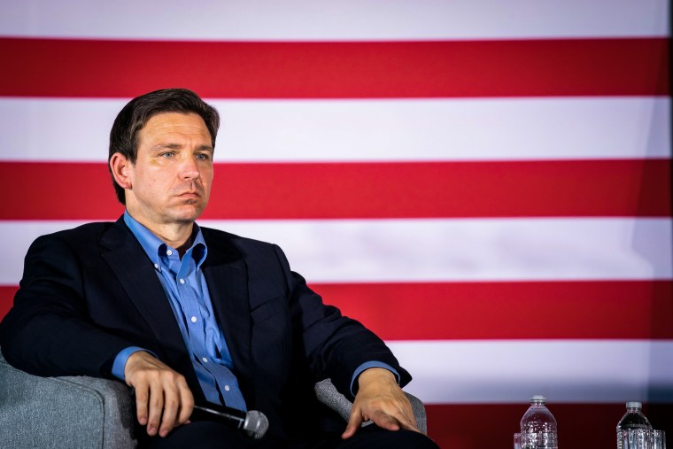 Image: Presidential candidate and Florida Governor Ron DeSantis listens to his wife speak to a crowd on June 2, 2023 in Gilbert, S.C.
