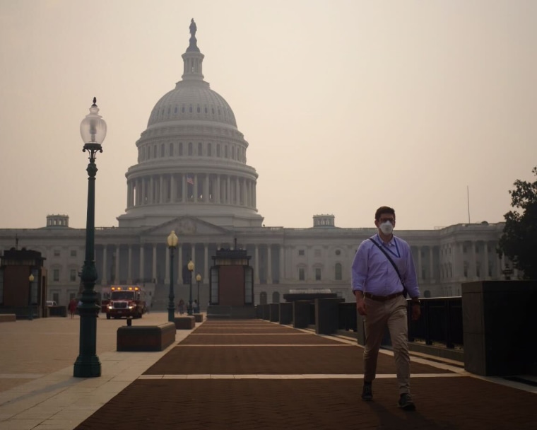 A person walks outside Capitol Hill on June 8, 2023.