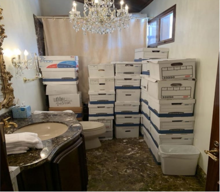 This image from the indictment against former President Donald Trump shows boxes of memos kept in the bathroom and shower of Trump's Lake Room at his Mar-a-Lago mansion in Palm Beach, Fla. Trump faces 37 felony charges Friday, June 9, 2023 day, mishandling classified documents under an unsealed indictment.  (AP via Department of Justice)