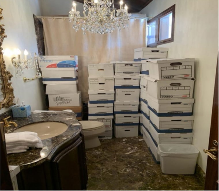 This image, contained in the indictment against former President Donald Trump, shows boxes of records stored in a bathroom and shower in the Lake Room at Trump's Mar-a-Lago estate in Palm Beach, Fla. Trump is facing 37 felony charges related to the mishandling of classified documents according to an indictment unsealed Friday, June 9, 2023. (Justice Department via AP)