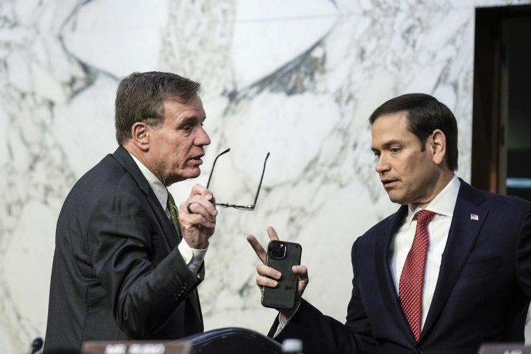 WASHINGTON, DC - MARCH 8: (L-R) Committee chairman Sen. Mark Warner (D-VA) talks with ranking member Sen. Marco Rubio (R-FL) during a Senate Intelligence Committee hearing concerning worldwide threats, on Capitol Hill March 8, 2023 in Washington, DC. The leaders of the intelligence agencies testified on a wide range of issues, including China, Covid-19 origins, and TikTok.