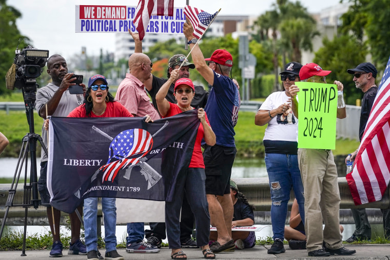 Image: Supporters of former President Donald Trump gather and await his arrival outside Trump National Doral resort in Doral, Fla., on June 12, 2023.