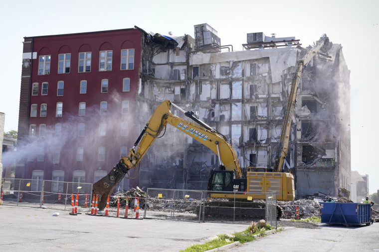 Demolition begins at the site of a building collapse on June 12, 2023, in Davenport, Iowa.