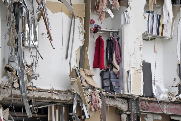 Personal belongings in a collapsed  section of an apartment building on June 5, 2023, in Davenport, Iowa.