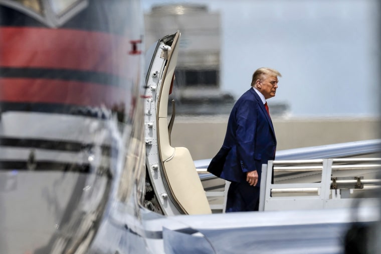 Image: Republican presidential candidate former U.S. President Donald Trump arrives at the Miami International Airport June 12, 2023 in Miami.