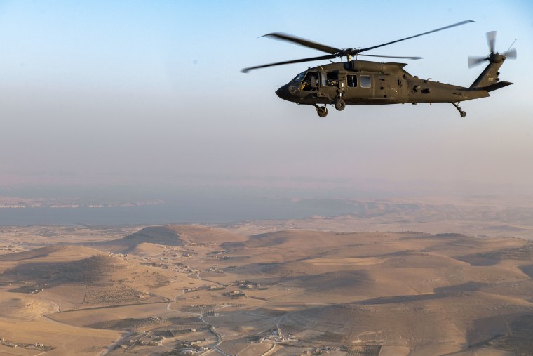 Black Hawk helicopters fly over Syria

A UH-60 Blackhawk, with Combined Joint Task Force - Operation Inherent Resolve, flies over the Syrian countryside, August 17, 2019. Blackhawk helicopters are essential air assets that fulfill a variety of roles that support the enduring defeat of Daesh.