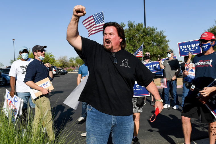 Nevada Republican Party Chairman Michael McDonald, center, protests against the passage of a mail-in voting bill in Las Vegas on Aug. 4, 2020.
