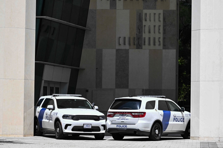 Police vehicles outside the Wilkie D. Ferguson Jr. United States Federal Courthouse in Miami on June 13, 2023.