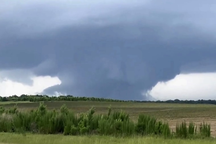 Tornadoes were reported as a rare outbreak of severe weather hit the ...
