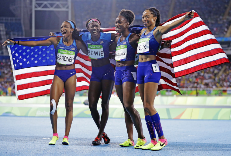 Members of the U.S. women's 4 x 100-meter relay English Gardner, Tori Bowie, Tianna Bartoletta and Allyson Felix, celebrate their gold medal at the Rio Olympics in 2016. 