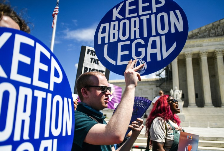 Activists gather at the Supreme Court on April 15, 2023, to protest increasing restrictions on access to abortion and abortion pills. 