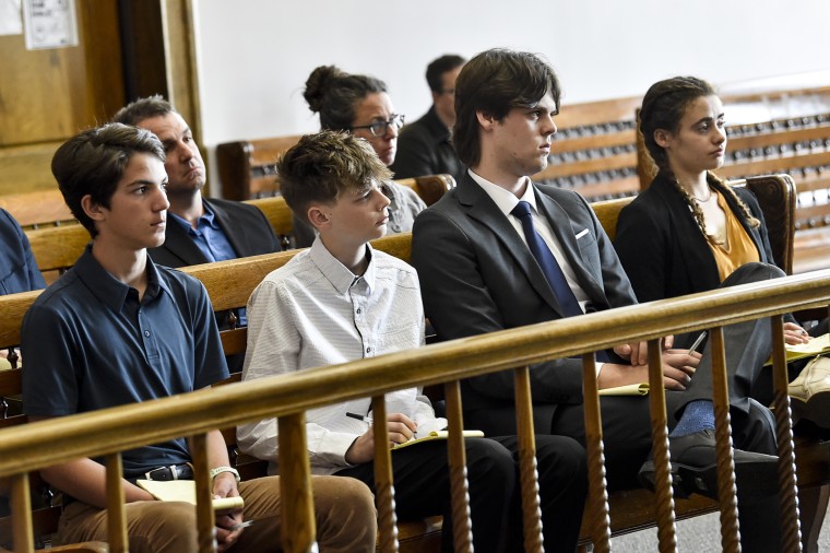 From left, plaintiffs Mica, Badge, Lander and Taleah, during a status hearing in Helena, Mont.