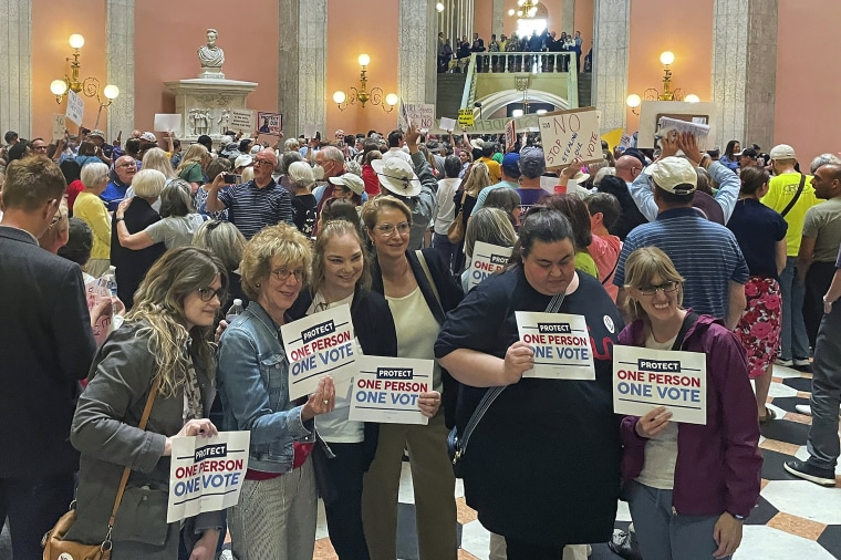 Supporters and opponents of a GOP-backed measure that would make it harder to amend the Ohio constitution packed the statehouse rotunda on May 10, 2023, in Columbus.