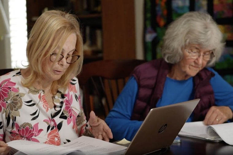 Donna Whitmore and Susan Gehlke of Hayward Concerned Citizens sift through the research they curated about Russell City.