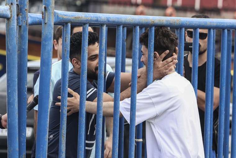 Emotional reunion for brothers as hopes fade for survivors of migrant boat shipwreck