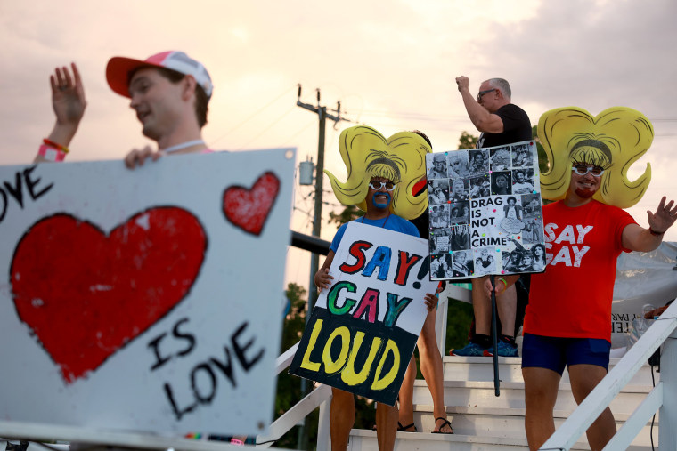 People protest anti-LGBTQ laws  during the Stonewall Pride parade  in Wilton Manors, Fla., on Saturday.