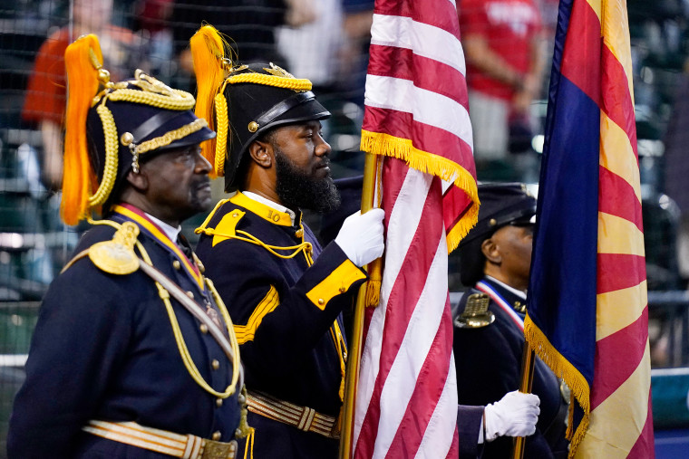 The Buffalo Soldiers Honor Guard at the Arizona Diamondbacks Juneteenth celebrations prior to a game against the Cleveland Guardians in Phoenix on June 16, 2023.