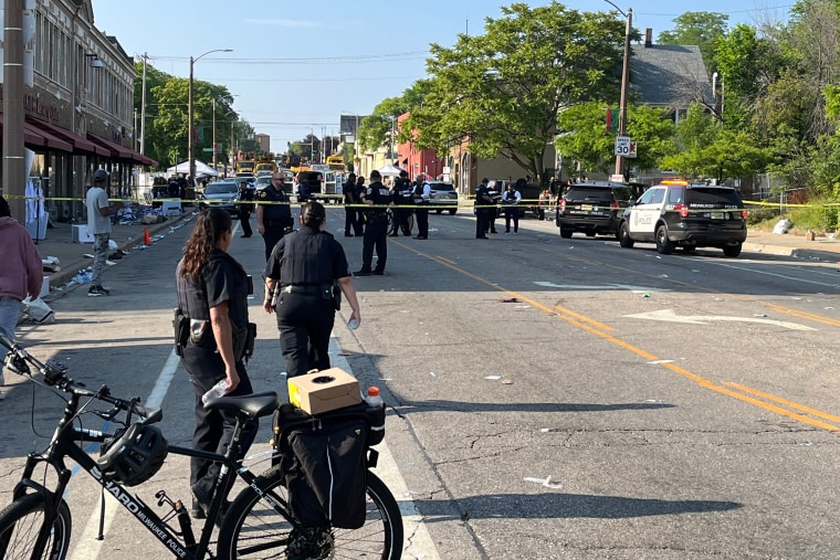 Police at the scene of a shooting shortly after the Juneteenth festival in Milwaukee on June 19, 2023.