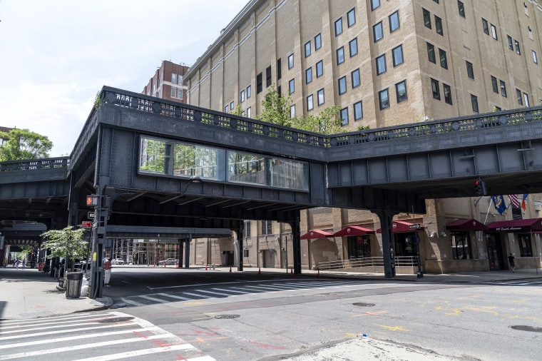 High Line Park reopens to the public with limited capacity after temporarily closed in March amid Covid-19 in New York on July 16, 2020. Park is public however financed by private investments. Strict social distancing rules are in place and visitors have to reserve free timed-ticket in advance online. Wearing mask is mandatory and green dots are placed on the ground six feet apart to keep visitors separated. (Photo by Lev Radin/Siap USA)(Sipa via AP Images)