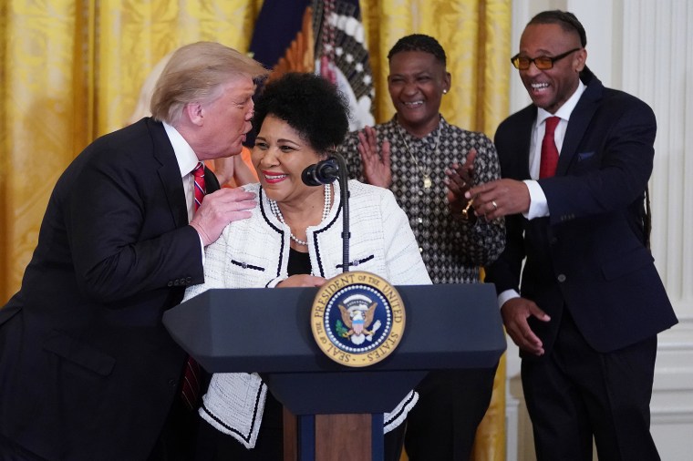 President Donald Turmp with Alice Marie Johnson during a celebration of the First Step Act in the White House on April 1, 2019.